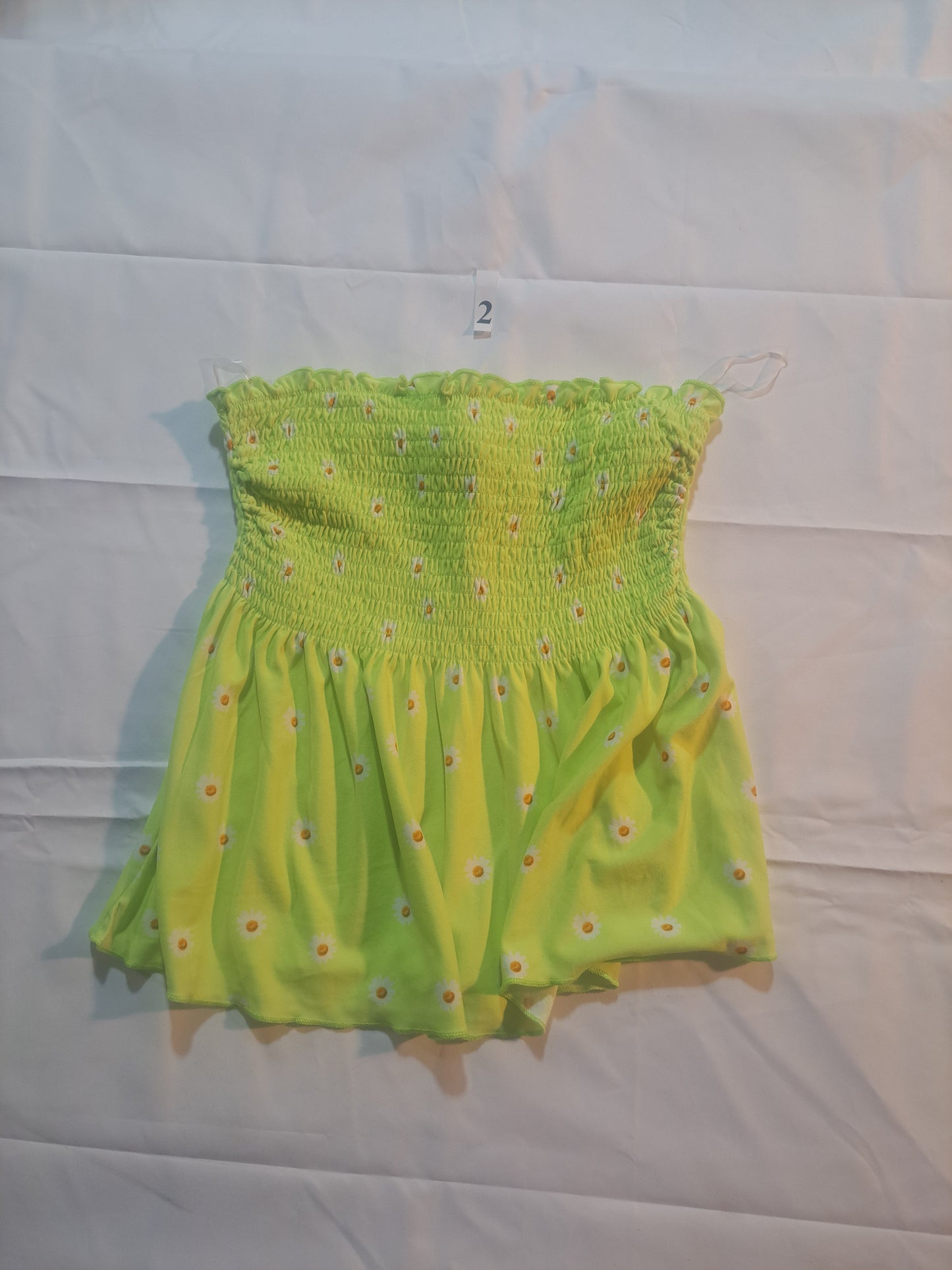 Strapless top with peplum waist